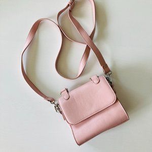 Pink mini cross-body satchel by Madden Girl